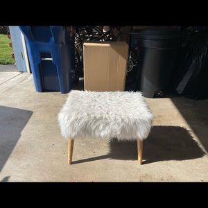Fluffy white stool